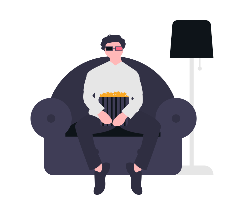 man sitting on couch and watching movies